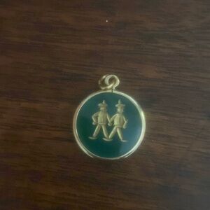 Gemini 14k jade pendent.